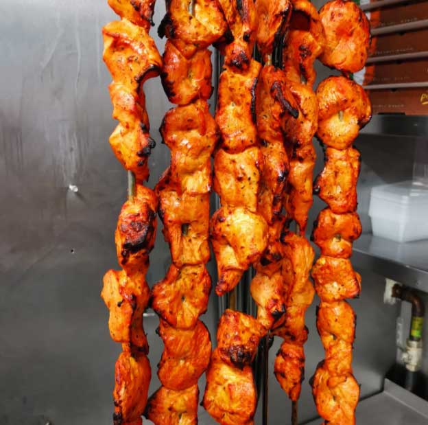 Tandoori chickens served at Village Takeaway in Glenboig